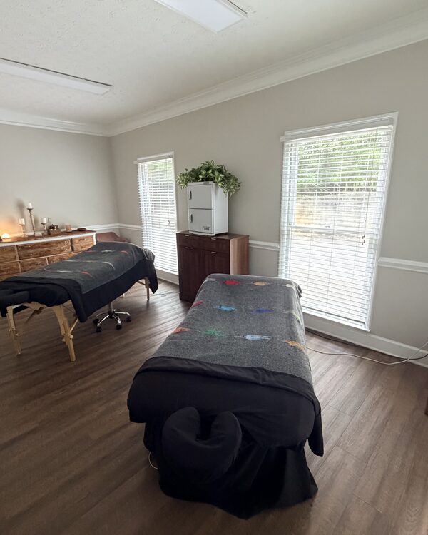 Treatment room with two tables at the new Athens studio
